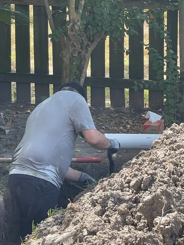Abacus technician working on underground pipe repair